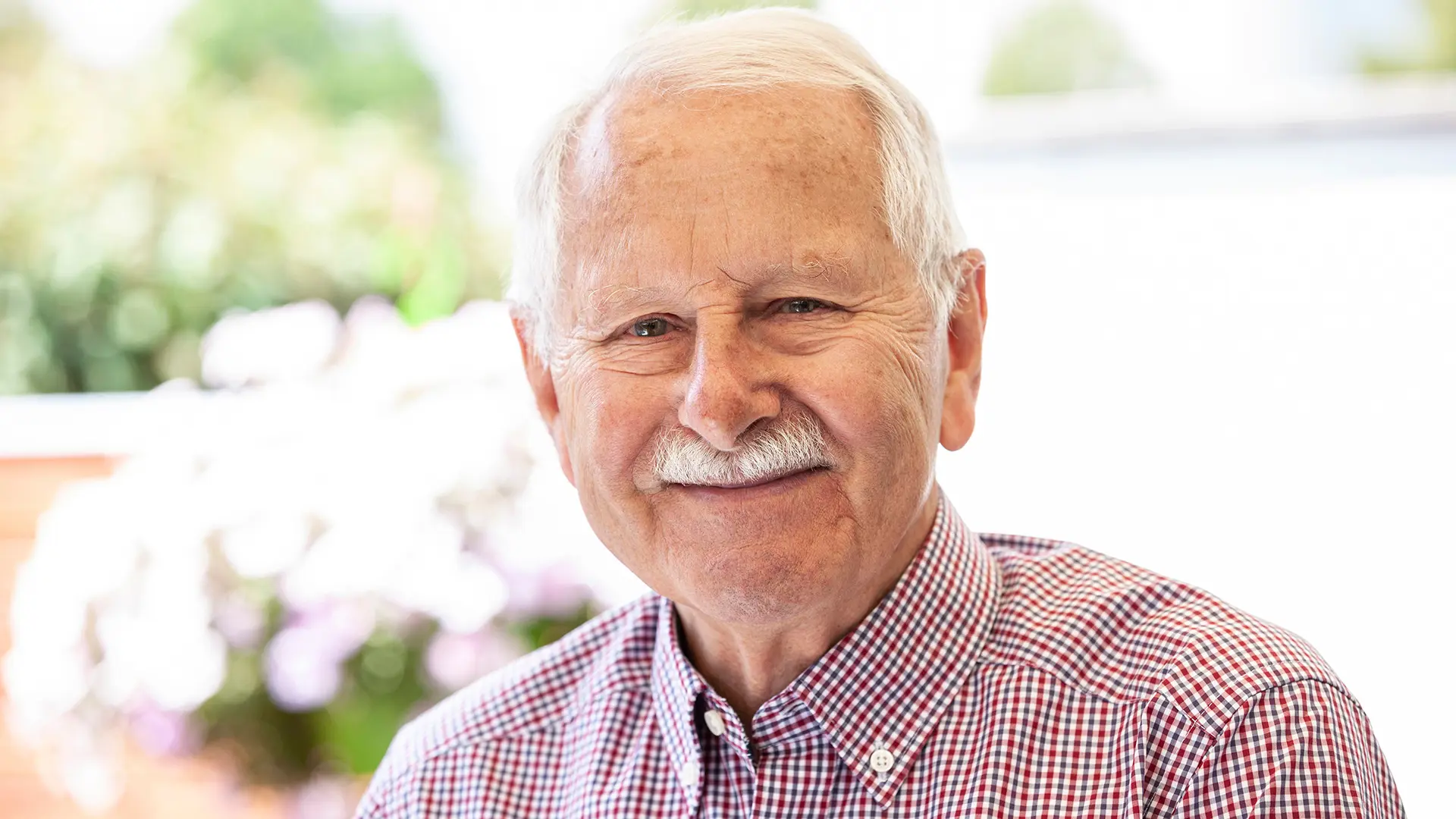 Older Man Smiling At Home